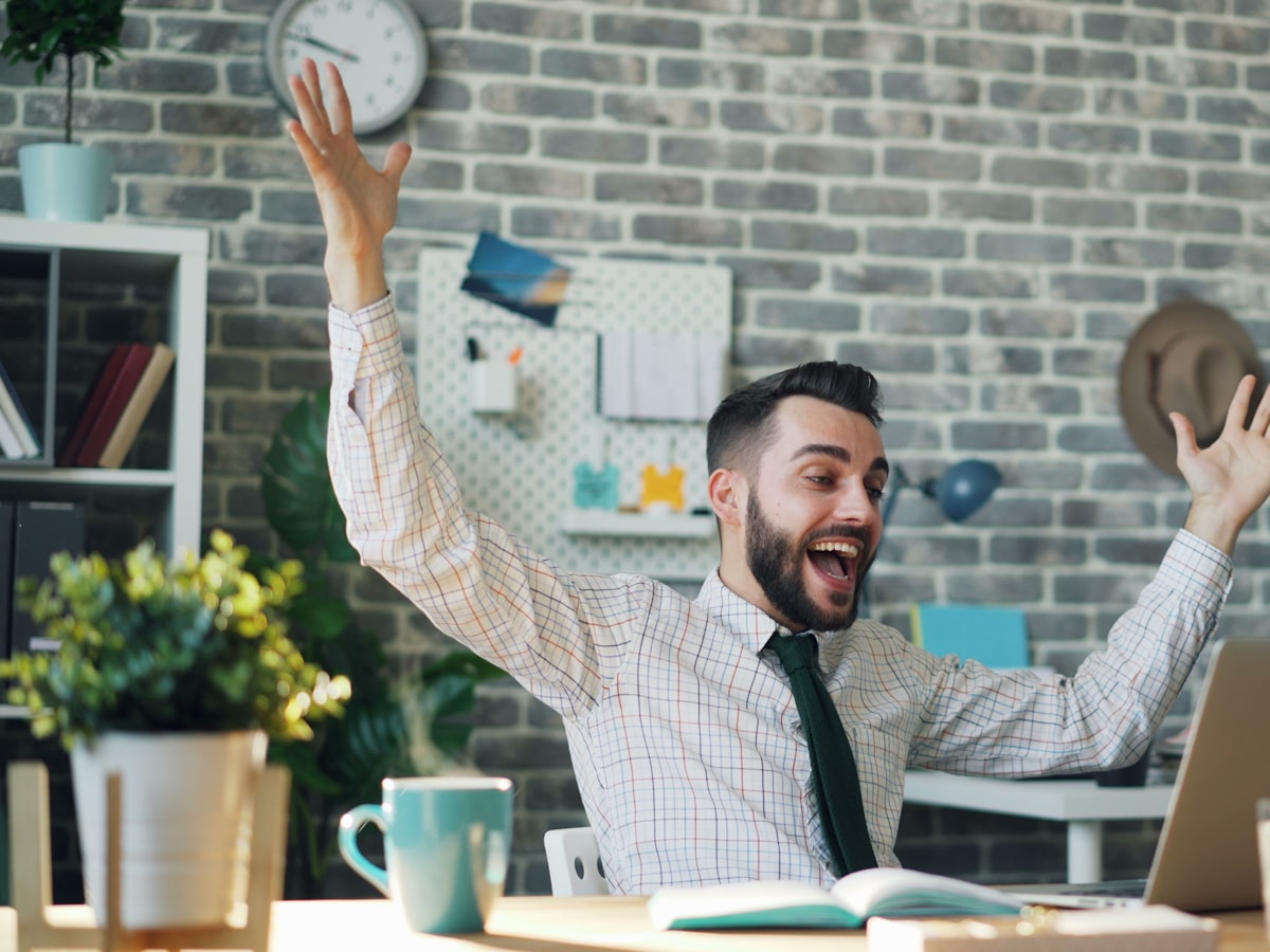 Celebrating a site launch at the desk
